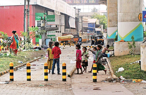 Children of migrant labourers play under the Metro Pillar at Aluva A Sanesh