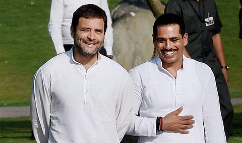 Congress chief Rahul Gandhi (L) and his brother-in-law Robert Vadra. (File | PTI)