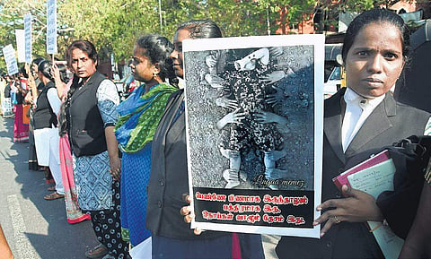 Members of Women’s Advocates Association of Madras High Court stage a protest demanding strict action against accused in Pollachi sex abuse case, in Chennai on Wednesday. (Photo | Ashwin Prasath, EPS)
