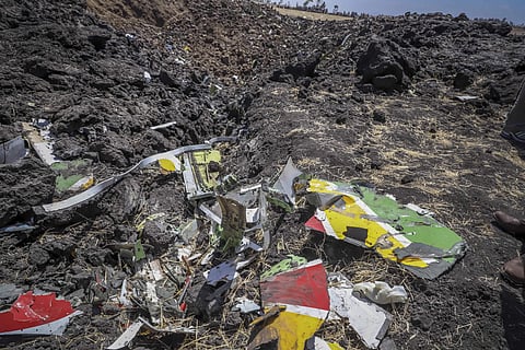 Rescuers search through wreckage at the scene of an Ethiopian Airlines flight that crashed shortly after takeoff  (Photo | AP)