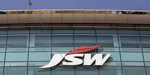 The logo of JSW is seen on the company's headquarters in Mumbai, India. (File photo | Reuters)