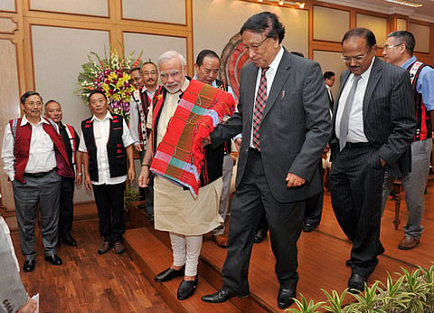 Prime Minister Narendra Modi with NSCN IM General Secretary Thuingaleng Muivah at the signing ceremony of historic peace accord between Government of India NSCN in New Delhi on August 3. NSA Ajit Doval is also seen. (Photo | PTI)