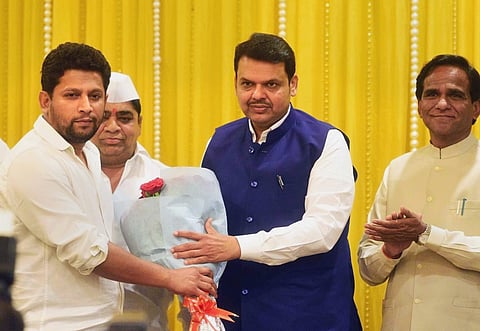 Sujay Vikhe Patil, the son of Congress leader and Leader of Opposition in the Assembly Radhakrishna Vikhe Patil.  A file photo of Sujay Radhakrishna Vikhe Patil being welcomed by Maharashtra Chief Minister Devendra Fadnavis as he joins BJP in Mumbai. (Fil
