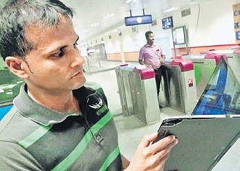 Sukramani Aich shows the damaged portion of the laptop | s Lalitha