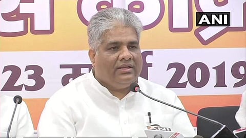 BJP in-charge for Bihar, Bhupendra Yadav announcing NDA's list of candidates in Bihar on 23 March 2019. (Photo | ANI Twitter)