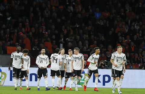 Germany's Nico Schulz, fourth from left, celebrates with his teammates after scoring his side's third goal during the Euro 2020 group C qualifying soccer match between Netherlands and Germany at the Johan Cruyff ArenA in Amsterdam. (Photo | AP)