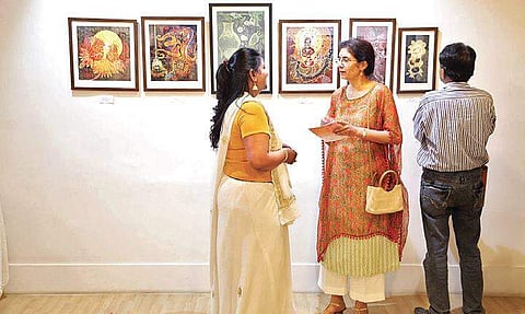 Art aficionados at the ongoing art exhibition featuring works of 15 artists.