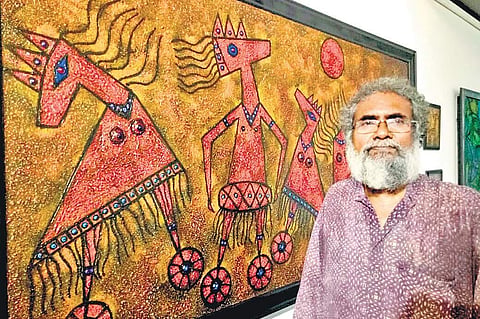 Artist  TA Satyapal with his art work