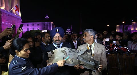 Indian Air Force officials show sections of an exploded Amraam missile said to be fired by Pakistan Air Force F-16s at an IAF, Army and Navy joint press conference at South Block in New Delhi. (Photo | EPS/Shekhar Yadav)