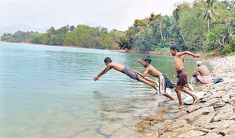 Children taking a dip in Neyyar dam to save themselves from the scorching sun. Mercury touched 35 degree Celsius in Thiruvananthapuam on Saturday | Vincent Pulickal