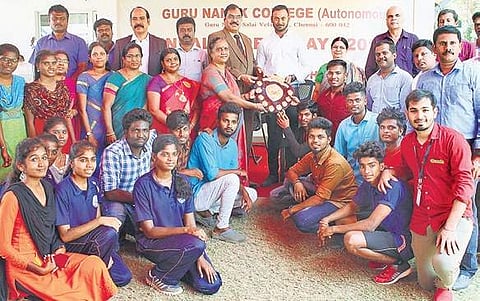 Cricketer and alumnus of Guru Nanak college, Arun Karthik, with winners and staff during the sports day celebrations at the college  | Nakshatra Krishna-moorthy.