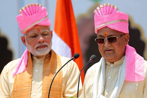 Nepalese Prime Minister Khadga Prasad Oli, right, and Indian Prime Minister Narendra Modi. (Photo | AP)
