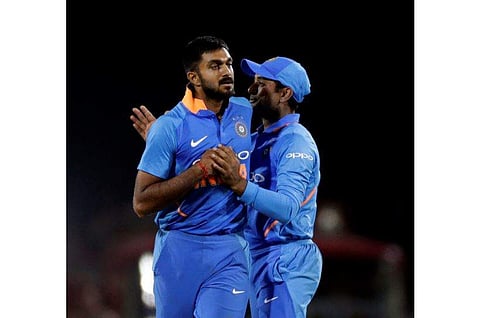 India's Vijay Shankar, left and Ambati Rayudu celebrate after winning the second one-day international cricket match against Australia in Nagpur. (Photo | AP)