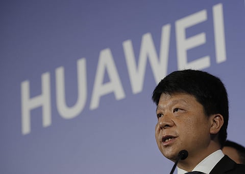 Huawei Rotating Chairman Guo Ping, center, speaks during a press conference in Shenzhen city, China's Guangdong province, Thursday, March 7, 2019. (Photo | AP)