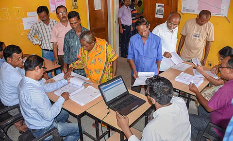 People check their names on the final draft of Assam's National Register of Citizens after it was released at a NRC Seva Kendra Hatigaon in Guwahati (File Photo |  PTI)