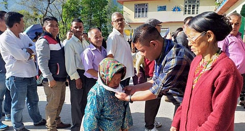 Voters being welcomed at polling station in Sikkim. (Twitter)