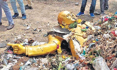 The statue of Dr BR Ambedkar at the Jawaharnagar dump yard after it was taken down by the GHMC on Saturday. | Express Photo Services