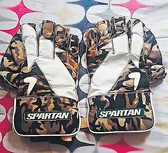 Gloves that Felix received from Indian cricketer M S Dhoni