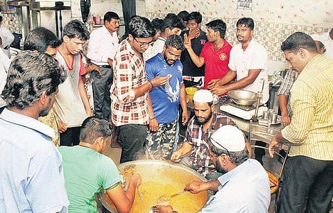 People throng a biriyani shop at Purusawalkam as most of the shops in the city were closed in view of the Lok Sabha election on Thursday | DEBADATA MALLICK