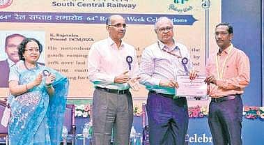 DCM and in-charge PRO K Rajendra Prasad receives  GM’s Award from SCR GM Gajanan Mallya | Express