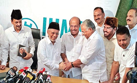 A file photo of IUML state president Panakkad Hyderali Shihab Thangal greets P K Kunhalikutty and E T Mohammad Basheer, who were declared candidates from Malappuram and Ponnani Lok Sabha constituencies, respectively  | EXPRESS