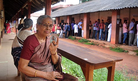 A 75-year-old voter poses post casting her vote in Kerala. (Photo| A  Sanesh/ EPS)