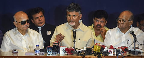 Andhra Pradesh Chief Minister Chandrababu Naidu speaks as Nationalist Congress Party President Sharad Pawar and senior Congress leader Sushilkumar Shinde look on during a press conference in Mumbai Tuesday April 23 2019. | PTI