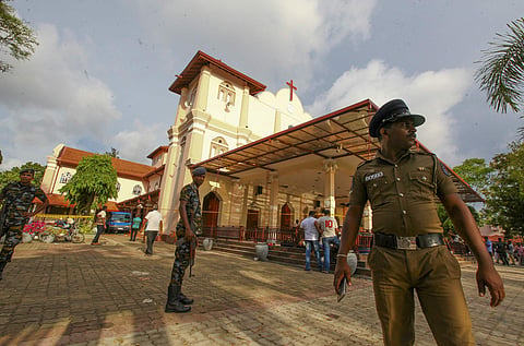 Sri Lankan army soldiers secure the area around St. Sebastian's Church damaged in blast in Negombo, north of Colombo, Sri Lanka, Sunday, April 21, 2019.  | AP