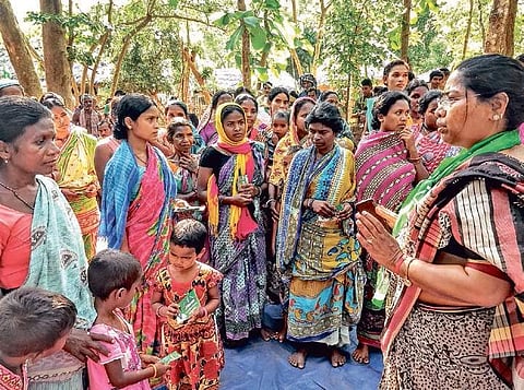 JMM Lok Sabha candidate Anjani Soren speaking to tribals at Kamarjanta village in Mayurbhanj district | Express
