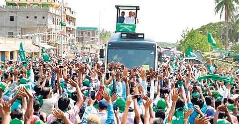 Naveen Patnaik during a road show in Kendrapara on Saturday I Express