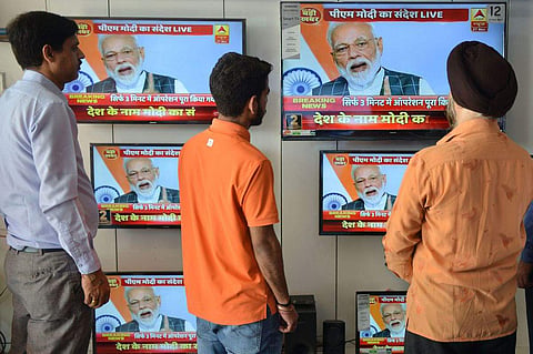 Prime Minister Modi addresses the nation on March 27 about destroying a low-orbiting satellite. (Photographer: Narinder Nanu/AFP via Getty Images)