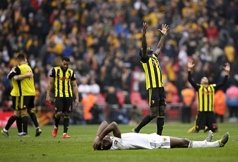 Watford's Ken Sema, center, celebrates at the end of the English FA Cup semifinal soccer match between Watford and Wolverhampton Wanderers at Wembley Stadium in London. (Photo | AP)