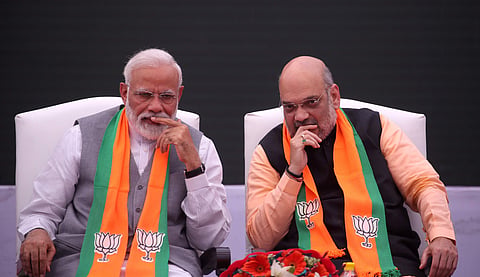Prime Minister Narendra Modi and BJP President Amit Shah after the release of Bharatiya Janata Partys BJP manifesto Sankalp Patra for Lok Sabha elections 2019 in New Delhi. (Photo | Shekhar Yadav, EPS)