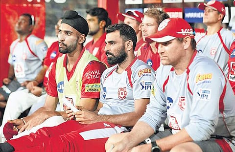 Kings XI Punjab’s bowling coach Ryan Harris (right) has a lot to worry about