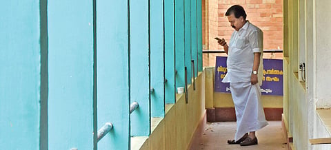 Opposition leader Ramesh Chennithala seen busy with his mobile phone just before speaking to journalists at the meet-the-press programme (Janayatham-2019) organised by Thiruvananthapuram Press Club on Monday | BP Deepu