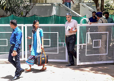 Income Tax officials during the second day of their raid at the residence of Praveen Kakkar OSD to MP Chief Minister Kamal Nath in Bhopal Monday April 8 2019. | PTI