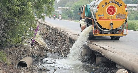 Raw sewage being disposed into the Cooum River by a private tanker near Thiruverkadu. Some lorries don’t have number plates, say locals | R Satish Babu