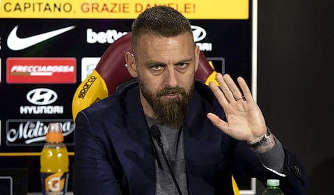 Roma midfielder Daniele De Rossi waves as he meets the media during a press conference at Trigoria training center in Rome. (Photo | AP)
