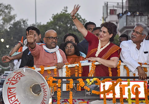 Congress General Secretary Priyanka Gandhi Vadra with the party candidate Ajay Rai and Chhattisgarh CM Bhupesh Singh Baghel during a roadshow for the Lok Sabha polls in Varanasi (Photo | PTI)