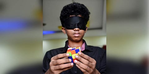 Dheepak has set a record for solving 555 Rubik cubes while being blindfolded with the Real World Record. (Photo | D Sampath Kumar, EPS)