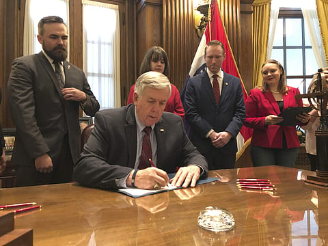 Missouri Governor Mike Parson signs one of the nation's most restrictive abortion bills, banning the procedure on or beyond eight weeks of pregnancy | AP