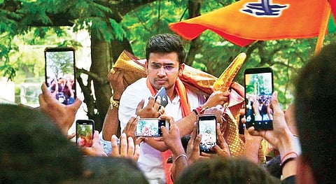 BJP’s Tejasvi Surya becomes the man of the moment after winning from Bangalore South seat. (Right) Actress Bhavana is all smiles at the BJP head office in Bengaluru on Thursday | pics: NAGARAJA GADEKAL, shriram B N. ( Photo | EPS)