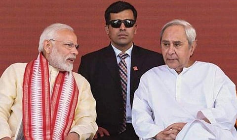 PM Modi (L) and Odisha CM and BJD chief Naveen Patnaik. 