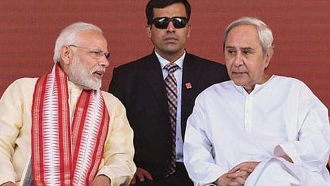 PM Modi (L) and Odisha CM and BJD chief Naveen Patnaik. 