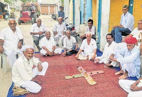 A group of old men playing ‘choupad pasa’ in Ganeshpura village of Rajasthan’s Dausa constituency