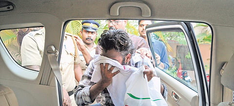 Riyas Aboobacker, member of IS module who planned suicide attack in Kerala, being taken to  NIA office in Kochi on Monday after the NIA court remanded him in custody/A Sanesh