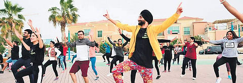(Above) A dance workshop of Pure Bhangra in progress; (left) group members after their performance at the Dubai campus of BTS-Pilani