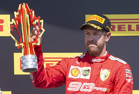 Vettel was punished for making an unsafe re-entry to the action | AP