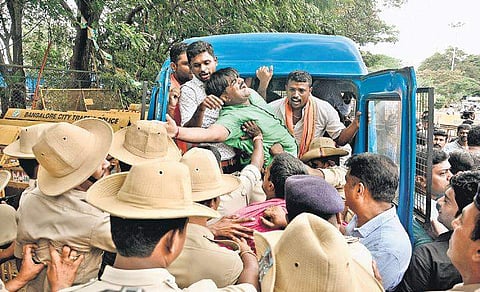 BJP Yuva Morcha members stage a protest against the state government over the Jindal land issue on Thursday in Bengaluru. They were arrested by the police and later released on the same day | SHRIRAM BN