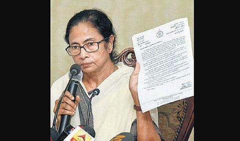 Bengal CM with a signed statement over the docs’ strike in Kolkata Saturday | PTI